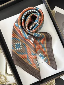 Close-up of geometric diamond pattern and silk texture on elegant professional scarf