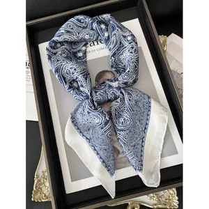 Elegant navy blue paisley silk scarf with classic pattern and white border for women