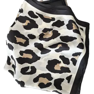 Elegant leopard print square silk scarf with black borders and premium satin texture
