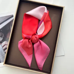 Silky square scarf with geometric pink and red color blocks in a premium gift box