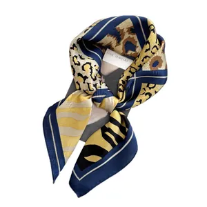 Fashionable leopard print silk scarf in navy blue and ginger yellow with wavy stripes