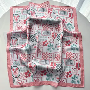 Detailed macro view of the premium satin silk square scarf with French vintage illustrations