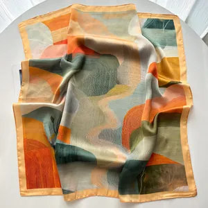 Detail of elegant silk scarf featuring abstract mountain and river oil painting prints