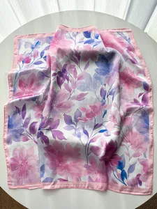 Close-up of French watercolor peony print on soft silk square scarf with pink border