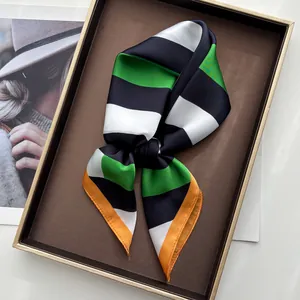 Lustrous silk-like square scarf featuring bold green and black stripes with orange edges