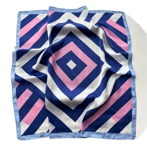 Striped geometric square silk scarf with blue and pink contrast patterns and satin finish