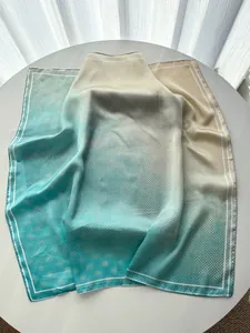 Detailed view of gradients and fine polka dots on elegant satin silk square scarf