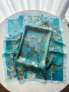 Close-up of Van Gogh Almond Blossom print square silk scarf with rolled hem edges