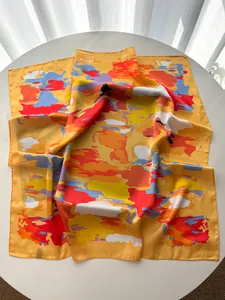 Detailed view of colorful abstract oil painting print on silk satin square scarf