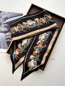 Detail of horse print silk twilly scarf with elegant black and gold satin texture