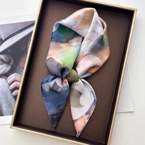 Abstract oil painting style floral silk scarf presented in a premium gold-trimmed gift box