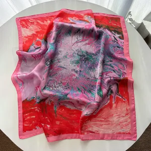 Detailed macro view of the silky square scarf featuring abstract oil painting patterns