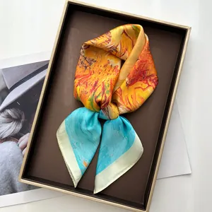 Detail of artistic oil painting print silk scarf with warm orange and lake blue tones