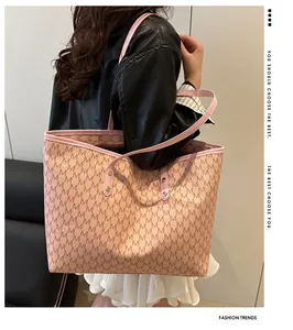 Macro view of the pink monogram tote bag featuring refined gold rivets and large capacity