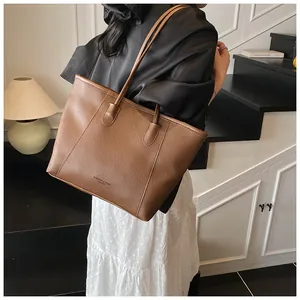 Bolso tote marrón con textura de lichi y asas finas para uso diario de oficina