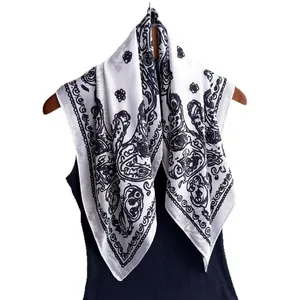 Elegant white paisley silk scarf for women featuring black floral pattern details