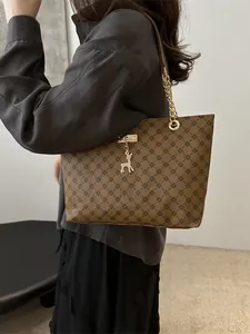 Brown checkered tote bag with gold chain strap and deer pendant for women daily use