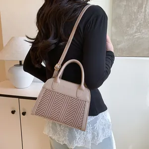 Retro patchwork crossbody bag in beige and coffee brown with houndstooth texture