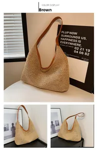 Close-up detail of hand-woven straw tote bag with brown leather strap and mesh texture