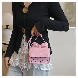 Pink bow mini crossbody bag for girls with black polka dots and fashion lettering