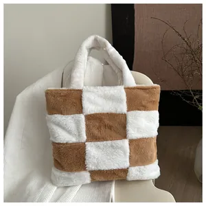 Close-up of fluffy checkerboard tote bag in brown and white plush wool fabric