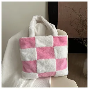 Close-up of pink and white checkered plush tote bag with soft faux fur texture