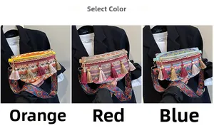 Detailed view of bohemian woven bags with tassels and embroidered geometric straps