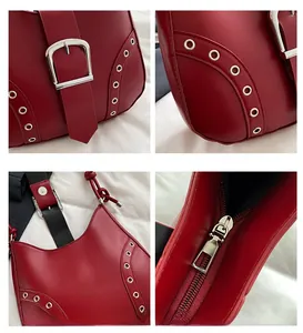 Detail der roten Kunstleder-Schultertasche mit Silberbeschlägen und Metallösen