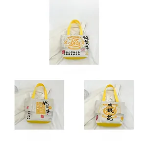 Three canvas bucket bags featuring traditional Chinese auspicious patterns and yellow handles