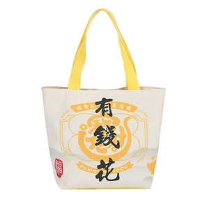 Canvas bucket tote bag in cream white with yellow handles and lucky calligraphy print