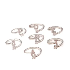 Adjustable silver letter rings set with micro-pave cubic zirconia alphabet designs