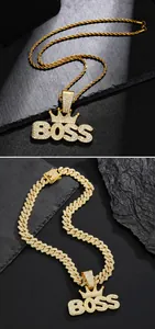 Detail der goldenen BOSS Krone Anhänger mit Strasssteinen auf Seil und Panzerkette