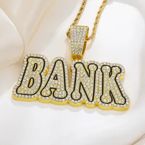 Macro shot of iced out BANK pendant with gold twisted rope chain for hip hop men