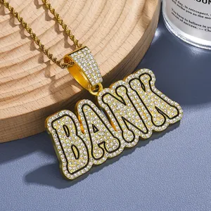 Macro shot of hip-hop BANK pendant encrusted with diamonds on gold twist rope chain