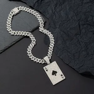 Close-up of hip-hop Ace of Spades pendant with sparkling crystals and Cuban chain link