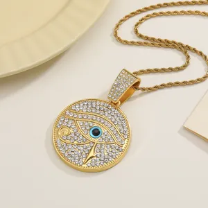 Gold Eye of Horus pendant necklace with sparkling cubic zirconia on a rope chain