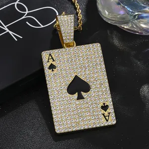 Macro detail of iced-out Ace of Spades poker pendant with gold chain in hip-hop style