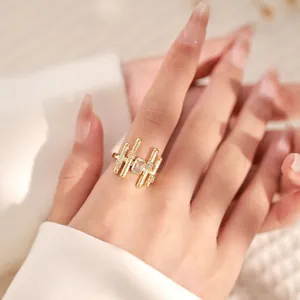 Close-up of 18K gold plated geometric ring with rectangle zircon and pave stones