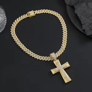 Detailed close-up of iced-out gold Cuban link necklace with a large cross pendant