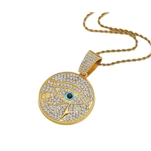 Golden Horus Eye medallion pendant necklace with cubic zirconia and twisted chain