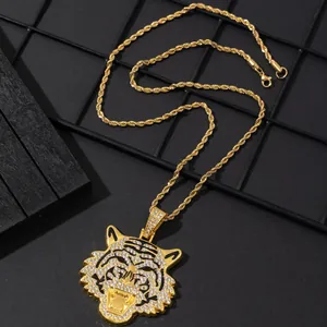 Iced-out tiger head pendant necklace with rhinestones and golden rope chain