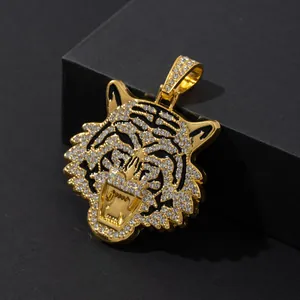 Hip hop gold tiger head pendant with full crystals on minimalist black background