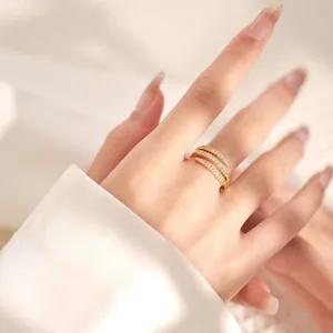 Close-up of 18K gold plated multi-layer ring with micro-pave cubic zirconia crystals
