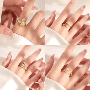 18K gold plated copper rings set with zircons in butterfly and geometric designs
