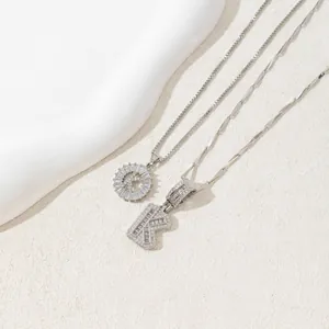 Silver iced-out letter K pendant necklaces with pavé zircon stones and flat wave chain