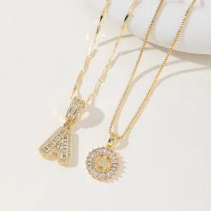 Luxury gold letter A pendant necklace set with cubic zirconia stones and elegant chains