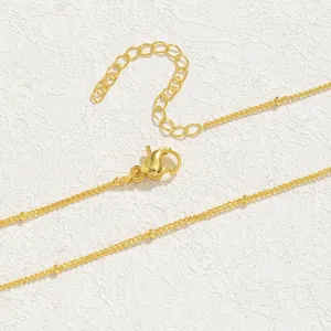 Luxurious gold-plated melon seed chain necklace with lobster clasp and bead details