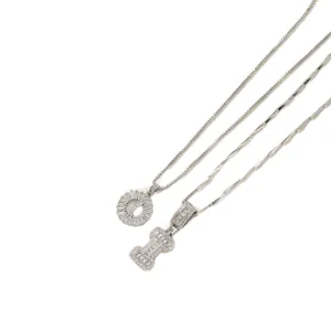 Letter I and O pendants necklace with sparkling cubic zirconia on silver-plated chain