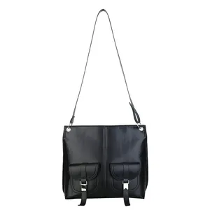 Classic black high-shine leather tote bag with functional front pockets and silver buckles