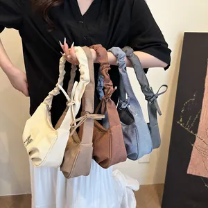 Chic pleated cloud shoulder bags in five colors with bow detail and scrunchie strap